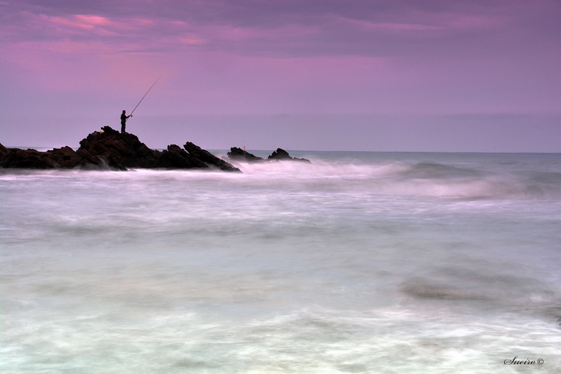 pescando al amanecer