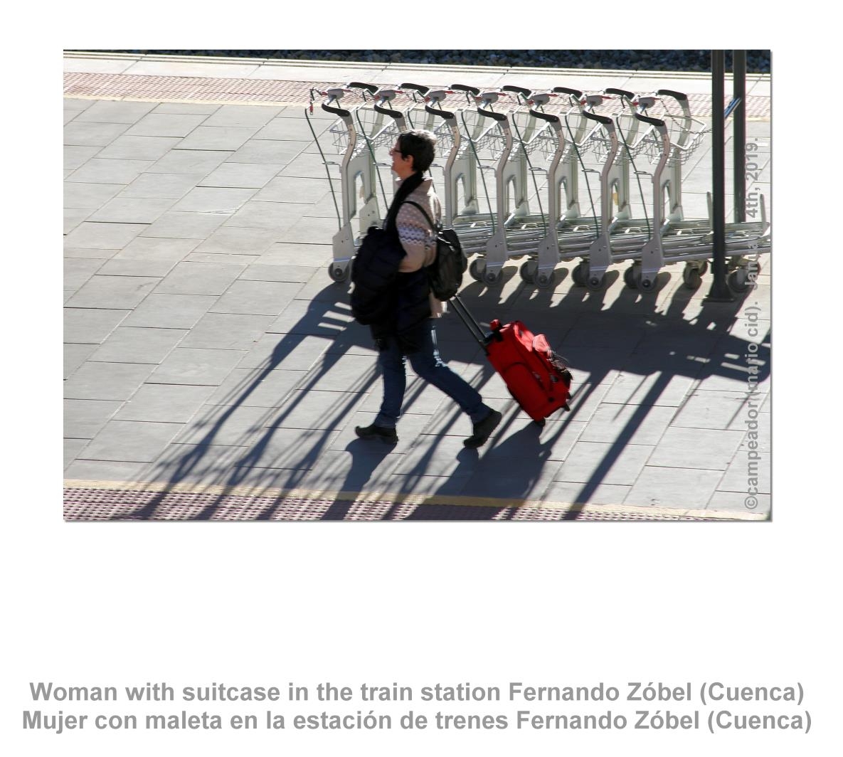 Woman with suitcase in the train station Fernando Zbel (Cuenca).  Mujer con maleta en la estacin de trenes Fernando Zbel (Cuenca)