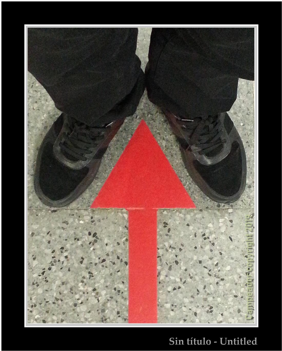 Untitled - Sin ttulo (flecha roja pintada en el suelo y zapatos deportivos negros)