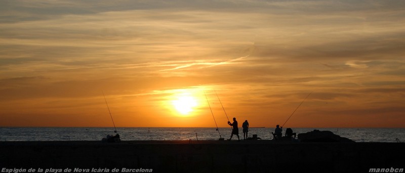 Pescadores a contraluz