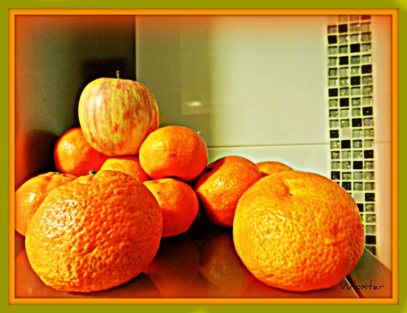Mandarinas y una Manzana