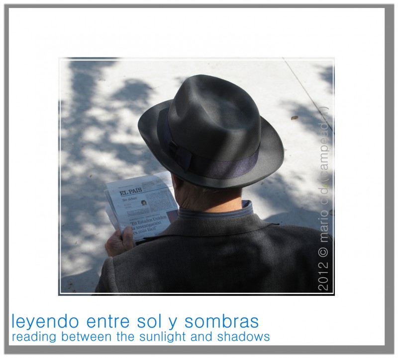 reading between sunlight and shadows - leyendo entre sol y sombras. Photo by Campeador.